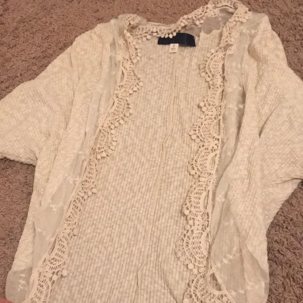 cream colored cardigan